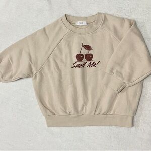 Cherry print graphic sweatshirt. Beige